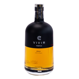 A bottle of VIVIR Reserva Tequila 10 Year Añejo rum in a black glass bottle with a black label and golden amber liquid, set against a plain white background.