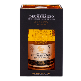 A boxed bottle of Drumshanbo Galanta Single Malt Irish Whiskey displayed in a black presentation box with a clear front window showing the amber liquid and label inside, on a plain white background.