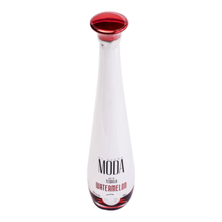 A white glass bottle of MODA Tequila Watermelon with a glossy red cap and red label accents, isolated on a white background.