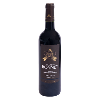 A bottle of Chateau Bonnet Reserve Bordeaux Merlot Cabernet Sauvignon red wine, featuring a dark glass bottle with a black label and gold lettering, set against a plain white background.