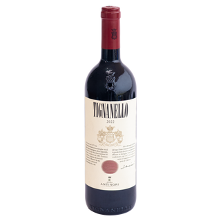 A bottle of Tignanello 2022 Antinori red wine, featuring a dark glass bottle with a cream-colored label and a red wax seal at the top, isolated on a white background.