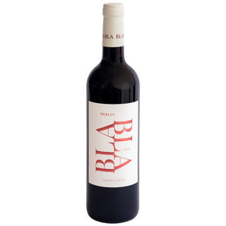 A bottle of BlaBla 2020 Merlot red wine, featuring a dark glass body, a white label with bold red stylized lettering, and a cream-colored neck foil, set against a plain white background.