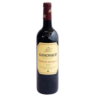 A bottle of Kanonkop Estate Wine Cabernet Sauvignon 2020, featuring a dark glass bottle with a cream-colored label and a dark red foil capsule at the neck, set against a plain white background.