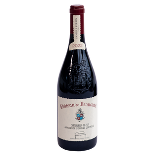 A bottle of Château de Beaucastel Chateauneuf du Pape 2022 Famille Perrin red wine, featuring a dark glass bottle with a cream-colored label and a dark red wax seal at the neck, set against a plain white background.