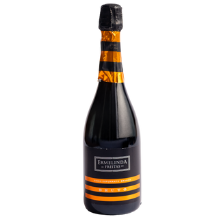 A bottle of Ermelinda Freitas Vinho Espumante Branco Bruto sparkling wine, featuring a dark glass bottle with a black label and bold orange stripes, sealed with a black and gold foil top, set against a plain white background.